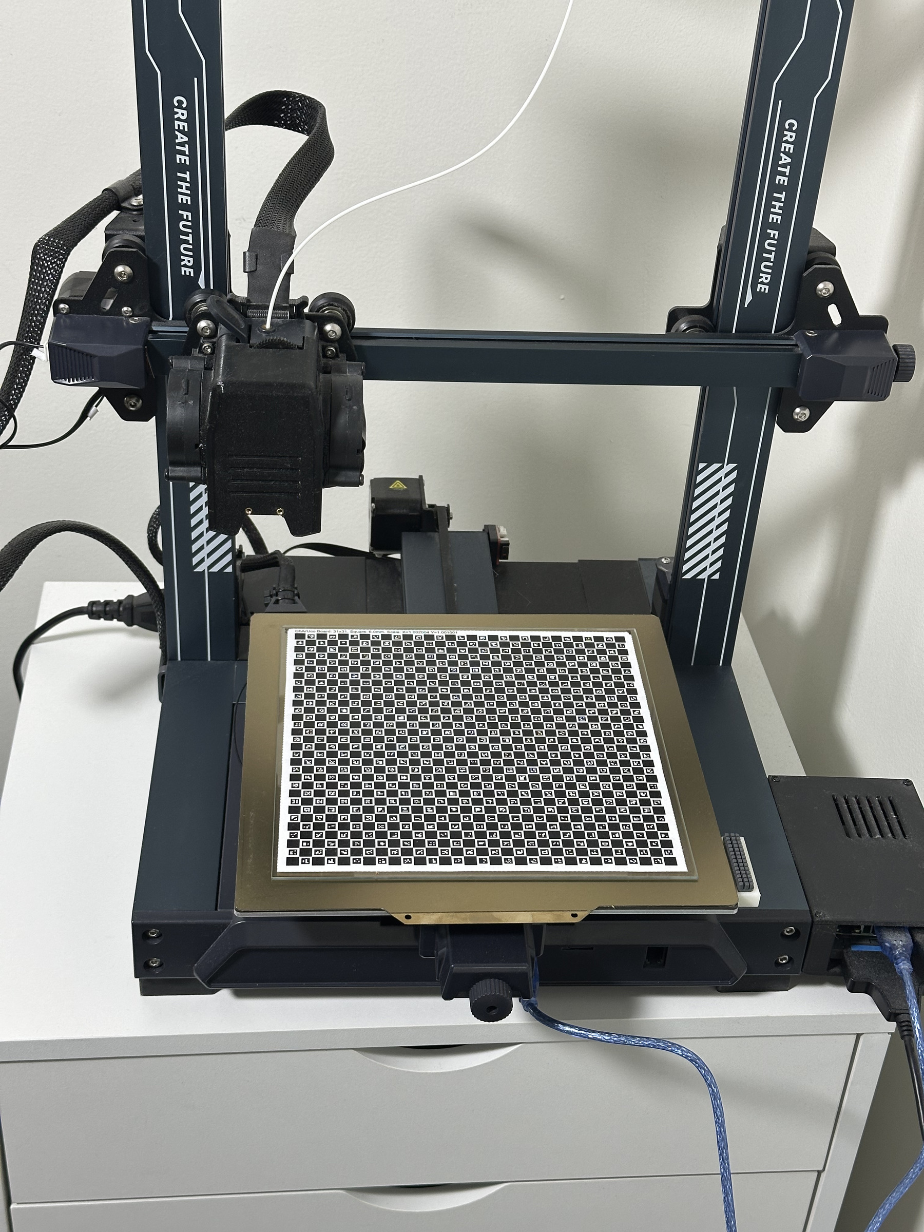 The printer with the ChArUco board on the bed, seen from the front