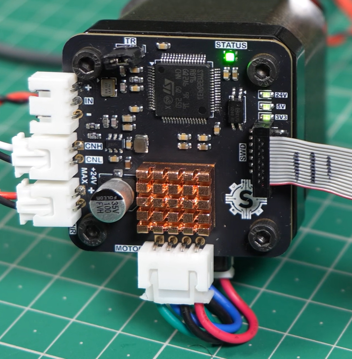 A joint driver board mounted on the back of a NEMA 17 stepper motor